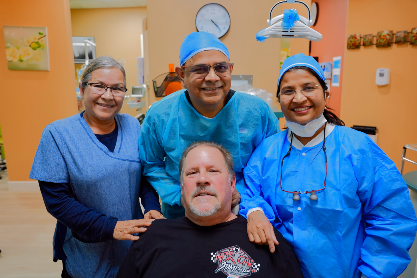 Patient in the treatment chair during a dental implant procedure